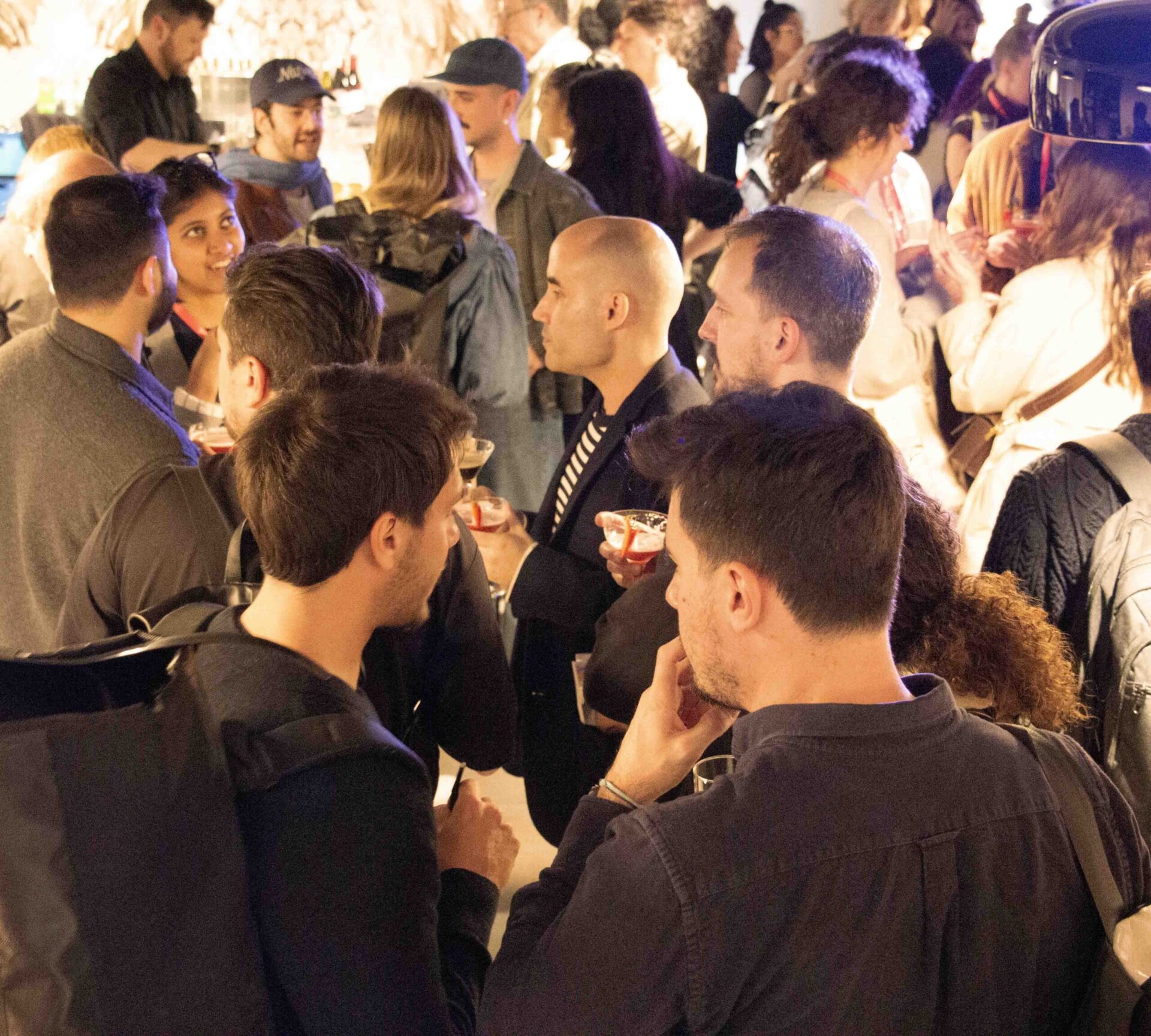 People socialising in the RAK Cermaics Design Hub on Clerkenwell Design Week.